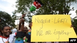 FILE - Kenyan gay and lesbian organizations demonstrate against harsh anti-LGBTQ+ laws, in Nairobi on Feb. 7, 2014. Nigerian lawmakers on July 10, 2024, criticized a multinational agreement with the European Union that some say could promote same-sex relationships.
