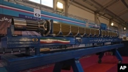 FILE - Iran's domestically built Nuclear Fuel Assembly is displayed in an exhibition of the country's nuclear achievements, in Tehran, Iran, Feb. 8, 2023. 