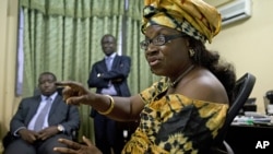 Opposition presidential candidate Julius Maada Bio of the Sierra Leone People's Party and his running mate Kadi Sesay (r) at SLPP party headquarters in Freetown, Sierra Leone, Nov. 20, 2012. 