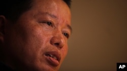 FILE - Gao Zhisheng, a human rights lawyer, speaks at a tea house in Beijing, China.