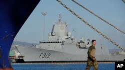 FILE - Norwegian frigate HNOMS Helge Ingstad lies docked at Cyprus’ Limassol port, Dec. 14, 2013. The warship and a Danish Frigate will escort Danish and Norwegian cargo ships transporting Syria’s most dangerous chemical weapons out of the country.