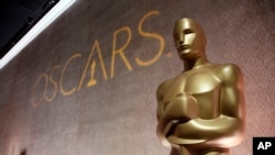 FILE - A giant Oscar statuette is seen at the 88th Academy Awards Nominees Luncheon in Beverly Hills, Calif. 