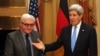 German Foreign Minister Frank-Walter Steinmeier , left, and U.S. Secretary of State John Kerry, meet during closed-door nuclear talks with Iran in Vienna, Nov. 22, 2014. 