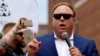 FILE - Alt-right conspiracy theorist Alex Jones speaks during a rally near the Republican National Convention in Cleveland, Ohio, July 18, 2016.