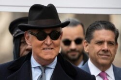 FILE - Roger Stone arrives for his sentencing at federal court in Washington, Feb. 20, 2020.