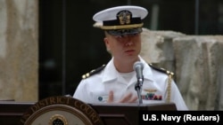FILE - Lieutenant Commander Edward Lin, at a 2008 naturalization ceremony in Hawaii. 