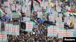 FILE - Protesters, predominantly Houthi supporters, demonstrate in solidarity with the Palestinians in the Gaza Strip, in Sanaa, Yemen, on Feb. 14, 2025.