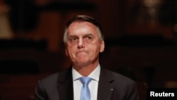 FILE - Former Brazilian President Jair Bolsonaro is pictured during an event at the Municipal Theater in Sao Paulo, Brazil, March 25, 2024. He was indicted Nov. 21, 2024, on charges of attempting a coup to keep him in office after his electoral defeat in 2022.