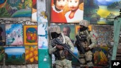 Soldiers patrol in Petion Ville, the neighborhood where the late Haitian President Jovenel Moise lived in Port-au-Prince, Haiti, July 7, 2021. 