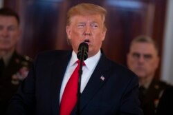 President Donald Trump addresses the nation from the White House on the ballistic missile strike that Iran launched against Iraqi air bases housing U.S. troops, Jan. 8, 2020, in Washington.