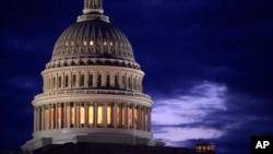 FILE - The U.S. Capitol dome is seen at dawn in Washington, March 30, 2017.