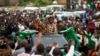 Le candidat présidentiel du Front patriotique Edgar Lungu et sa femme Esther se rendent à un rassemblement à Lusaka, Zambie, 19 janvier 2015.