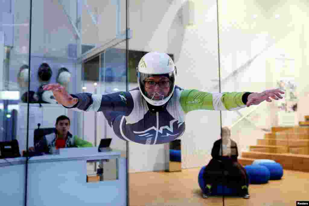 Paloma Granero, 38, a skydiving instructor, poses for a photograph inside the wind tunnel at Windobona indoor skydiving in Madrid, Spain, Feb. 24, 2017. &quot;Men don&#39;t have to prove themselves like we do. We are tested every day,&quot; Granero said. &quot;The instruction jobs still go mostly to men, whereas the administrative jobs go mostly to women.&quot;