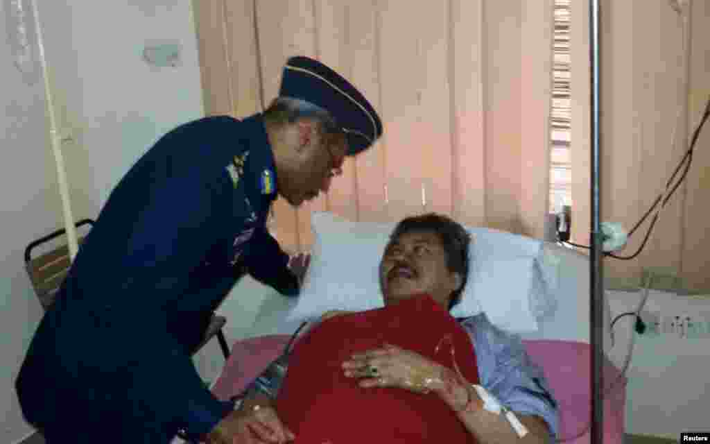 Air Chief Marshal Sohail Aman visits Malaysian Ambassador Hasrul Sani Mujtabar at the CMH hospital in Gilgit, Pakistan, on May 8, 2015.