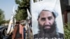 FILE - A poster of Taliban Supreme Leader Hibatullah Akhundzada is seen along a road in Kabul, Aug. 14, 2023. ICC chief prosecutor’s announced, Jan. 23, 2025, seeking arrest warrants for Akhundzada and a close associate accused of crimes against humanity.