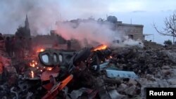 The scene shows, what according to Syrian rebels were fires caused by Russian military plane shot down by rebel forces near Idlib, reportedly on Feb. 3, 2018.