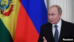 Russian President Vladimir Putin speaks as he meets with his Bolivian counterpart at the Kremlin in Moscow, Russia, July 11, 2019.