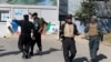 Afghan police arrive at the site of an attack at Kabul University in Kabul, Afghanistan, Nov. 2, 2020.