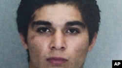 FILE - This file photo provided by the Fairfax County Police Department shows Darwin Martinez-Torres, of Sterling, Virginia. A change-of-plea hearing has been set for Wednesday morning in Fairfax for Darwin Martinez-Torres of Sterling who has been charged in Hassanen's death.