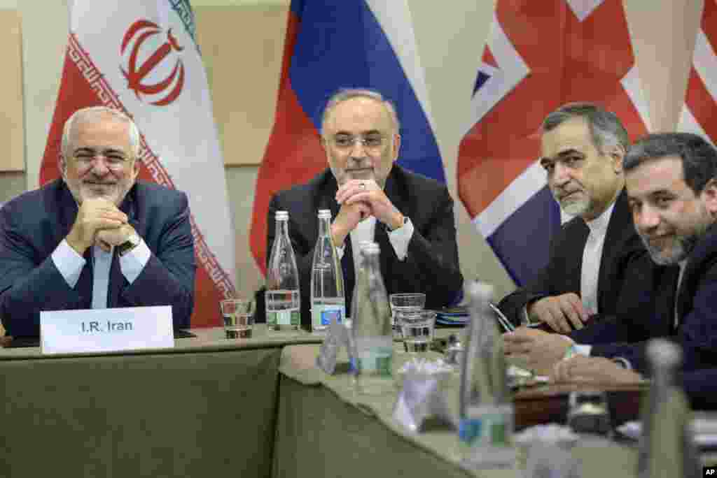 Iranian Foreign Minister Javad Zarif (left), head of Iranian Atomic Energy Organization Ali Akbar Salehi (second left), Special Assistant to President Rouhani Hossein Fereydoun (second right), and Iranian Deputy Foreign Minister Abbas Araghchi wait for the start of nuclear negotiations with P5 +1 officials at the Beau Rivage Palace Hotel in Lausanne, Switzerland, March 30, 2015.