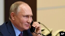 Le président russe Vladimir Poutine dans sa résidence de Novo-Ogaryovo, près de Moscou, le 10 décembre 2020. 