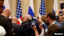 Security personnel remove Sam Husseini (center), ahead of a joint press conference by U.S. President Donald Trump and Russian President Vladimir Putin in Helsinki, Finland, July 16, 2018.