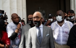 The Rev. Al Sharpton arrives to speak at the “Get Your Knee Off Our Necks March," in Washington, Aug. 28, 2020, on the 57th anniversary of the Rev. Martin Luther King Jr.'s "I Have A Dream" speech.