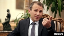 Lebanon's Foreign Minister Gebran Bassil talks during an interview with Reuters at his office in Beirut, Sept. 10, 2015. 