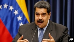 El presidente de Venezuela Nicolás Maduro habla durante una conferencia de prensa en el Palacio de Miraflores en Caracas, Venezuela, el 18 de septiembre del 2018.