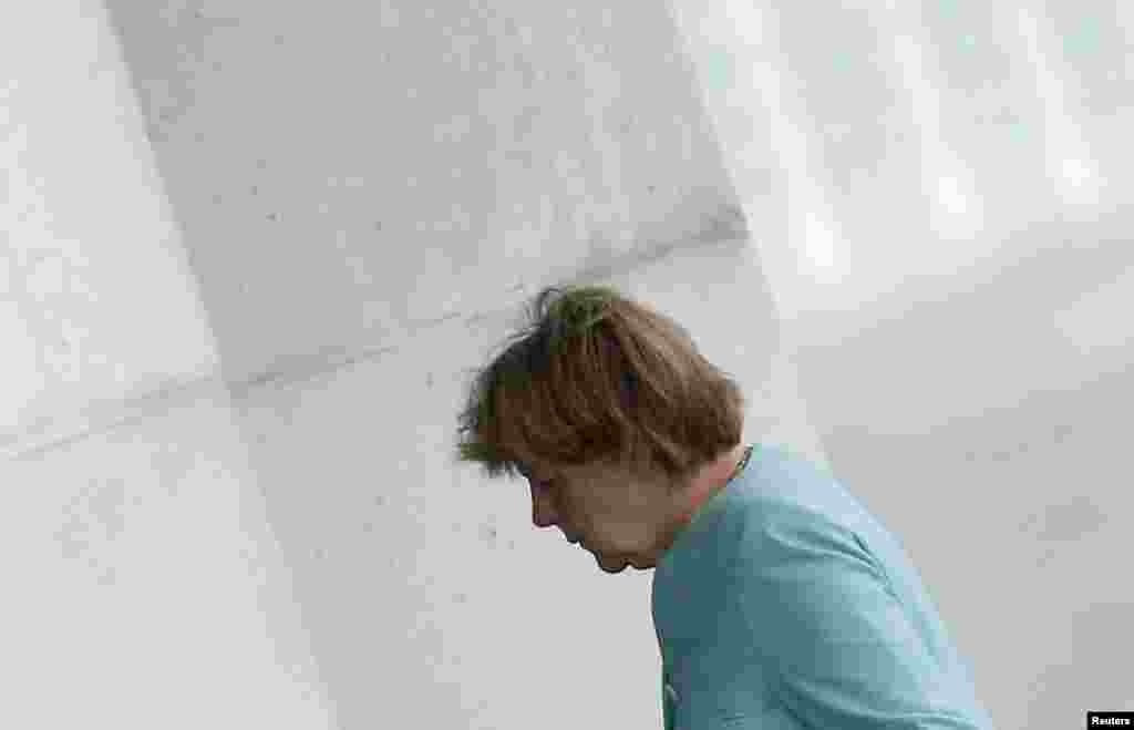 German Chancellor Angela Merkel arrives at the Chancellery in Berlin, Germany. France and Germany called for an emergency summit of euro zone leaders to discuss Greece&#39;s stunning referendum vote on Sunday to reject bailout terms, July 6, 2015.