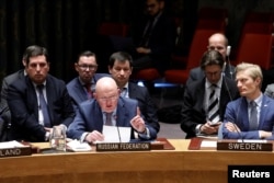 Russian Ambassador to the United Nations Vassily Nebenzia speaks during a United Nations Security Council meeting, New York, April 18, 2018.