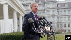 Republican Sen. Lindsey Graham speaks to members of the media outside the West Wing of the White House in Washington, after his meeting with President Donald Trump, Dec. 30, 2018.