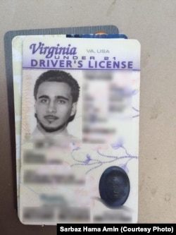 A driver's license of an American identified as Mohamed Jamal Khweis, accused of being a member of the Islamic State group, who has surrendered to Kurdish Peshmerga forces in northern Iraq.