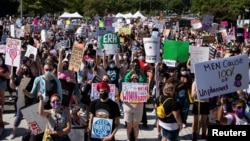 Supporters of reproductive choice rally at Freedom Plaza before marching to the U.S. Supreme Court during the nationwide Women's March, in Washington, Oct. 2, 2021.