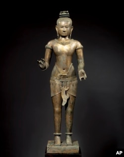 This March 2007 photo shows a bronze sculpture titled "Standing Shiva" at the Metropolitan Museum of Art in New York. The sculpture will be returned to Cambodia or Thailand.