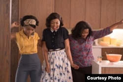 Mary Jackson (Janelle Monae, left), Katherine Johnson (Taraji P. Henson) and Dorothy Vaughan (Octavia Spencer) celebrate their stunning achievements in one of the greatest operations in history. (Photo: Hopper Stone, courtesy 20th Century FOX)