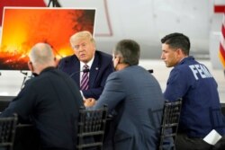 President Donald Trump speaks during a briefing at Sacramento McClellan Airport, in McClellan Park, California, Sept. 14, 2020, on the western wildfires.