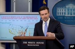FILE - White House press secretary Josh Earnest discusses Zika virus during the daily news briefing at the White House in Washington, May 11, 2016.
