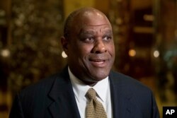 Lockheed Martin Senior Vice President Leo Mackay speaks to reporters as he departs from Trump Tower in New York, Jan. 3, 2017.