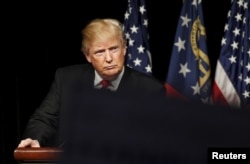 Republican U.S. presidential candidate Donald Trump speaks at a campaign rally at the Georgia World Congress Center in Atlanta, Georgia, Feb. 21, 2016.