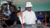 Joseph Nyuma Boakai, Liberia's vice president and presidential candidate of Unity Party (UP), votes at a polling station in Monrovia, Liberia.