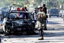 Pasukan garda nasional dikerahkan pasca kerusuhan dan penjarahan di Minneapolis, Minnesota (30/5).