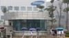 FILE - Employees make their way to work at the Samsung factory in Thai Nguyen province, north of Hanoi, Vietnam, Oct. 13, 2016. 