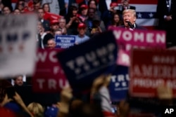 FILE - President Donald Trump addresses a rally in Nashville, Tennessee, March 15, 2017.