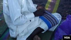 A bama cap being made. Depending on the number of layers in the design, a cap can take anywhere from two to five weeks to sew. (C. Oduah/VOA)
