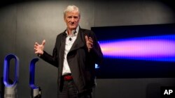 In this photo taken by AP Images for Dyson, inventor James Dyson launches the Dyson DC41 Ball vacuum and the Dyson Hot heater fan on Wednesday, Sept, 14, 2011 in New York. (Rob Bennett/AP Images for Dyson)
