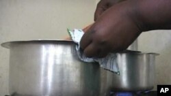 Saving money is one of the many benefits of clean cookstoves, which use natural gas, solar power or electricity, Kenya, May 2, 2012. 