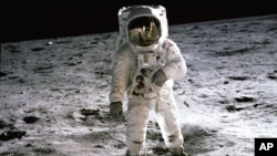 FILE - Apollo 11 Astronaut Buzz Aldrin walks on the surface of the moon in a July 1969 photo.