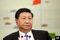 FILE - China's President Xi Jinping attends a meeting of the second Understanding China Conference, in Beijing, China, Nov. 3, 2015.
