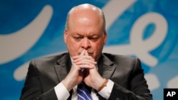 FILE - Ford Motor Company CEO Jim Hackett listens to a question in Dearborn, Mich., May 22, 2017.